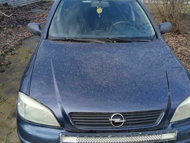 Синий Опель Астра, объемом двигателя 2 л и пробегом 300 тыс. км за 1500 $, фото 1 на Automoto.ua
