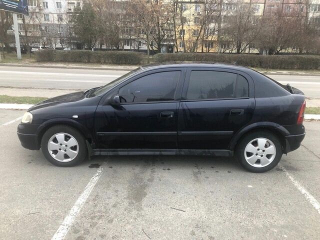 Синий Опель Астра, объемом двигателя 1.7 л и пробегом 170 тыс. км за 1000 $, фото 1 на Automoto.ua