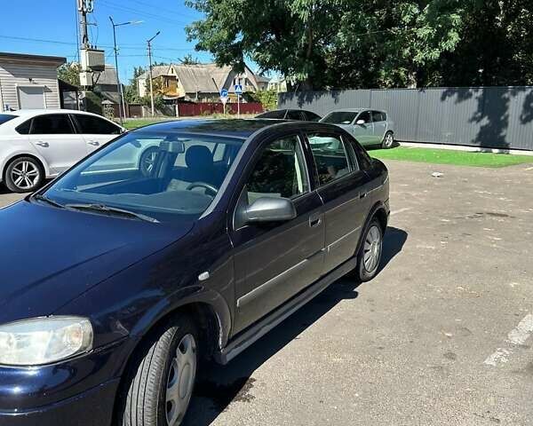 Синий Опель Астра, объемом двигателя 1.6 л и пробегом 202 тыс. км за 3000 $, фото 1 на Automoto.ua