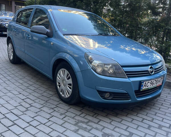 Синий Опель Астра, объемом двигателя 1.6 л и пробегом 210 тыс. км за 5600 $, фото 1 на Automoto.ua