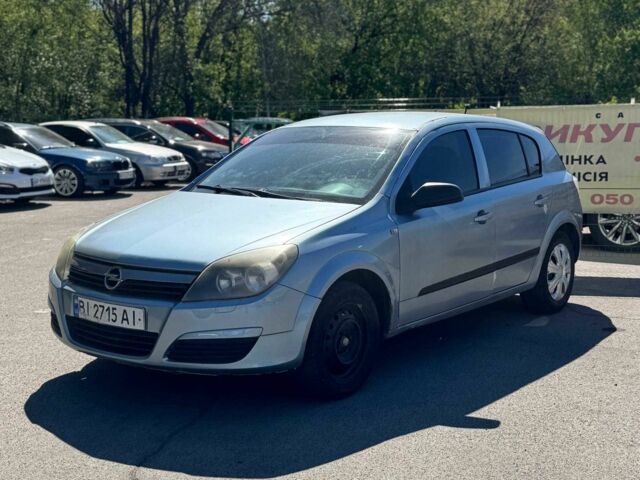 Синий Опель Астра, объемом двигателя 1.4 л и пробегом 250 тыс. км за 1350 $, фото 1 на Automoto.ua