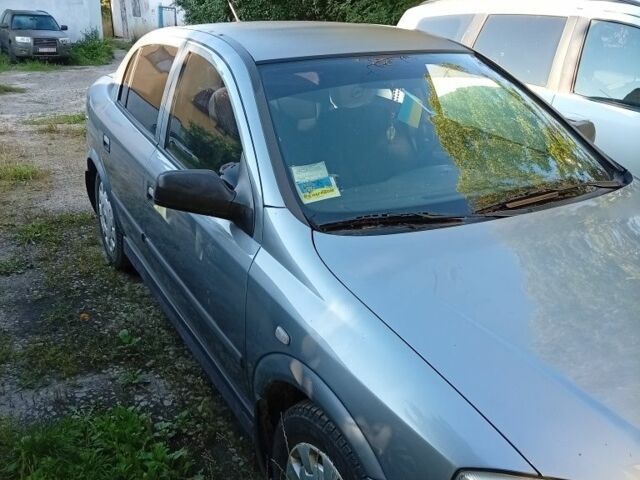 Синій Опель Астра, об'ємом двигуна 1 л та пробігом 170 тис. км за 2208 $, фото 1 на Automoto.ua