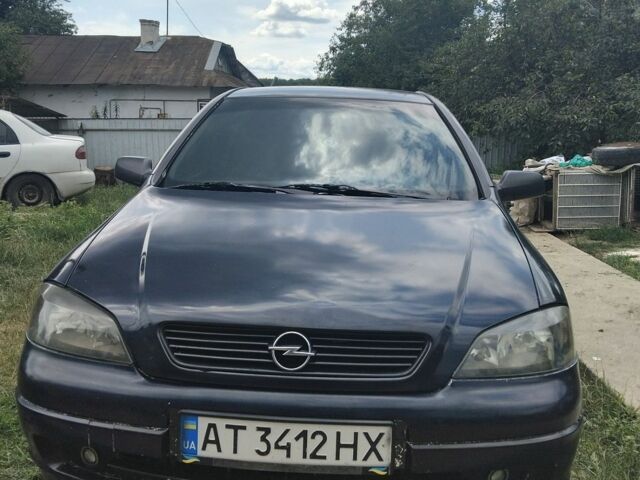 Синій Опель Астра, об'ємом двигуна 2 л та пробігом 300 тис. км за 1800 $, фото 1 на Automoto.ua