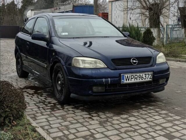 Синий Опель Астра, объемом двигателя 1.6 л и пробегом 300 тыс. км за 900 $, фото 1 на Automoto.ua