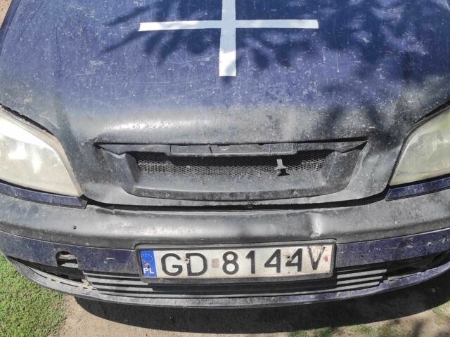 Синий Опель Астра, объемом двигателя 2 л и пробегом 250 тыс. км за 1500 $, фото 1 на Automoto.ua