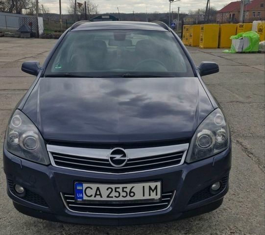 Синий Опель Астра, объемом двигателя 1.6 л и пробегом 142 тыс. км за 5400 $, фото 1 на Automoto.ua