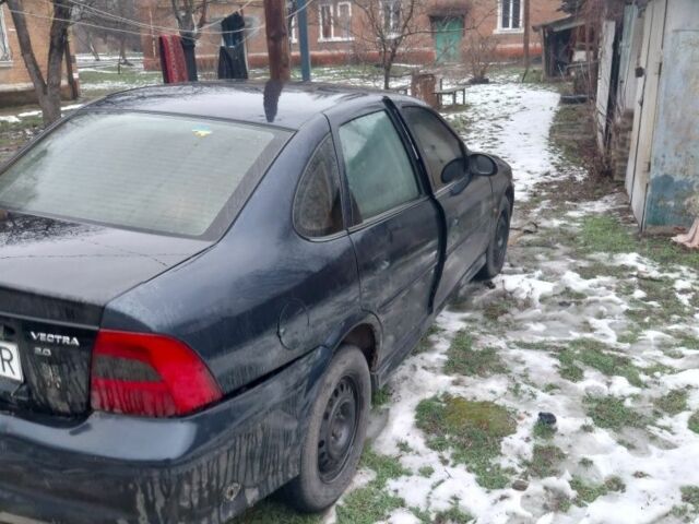 Синий Опель Астра, объемом двигателя 2 л и пробегом 270 тыс. км за 582 $, фото 1 на Automoto.ua