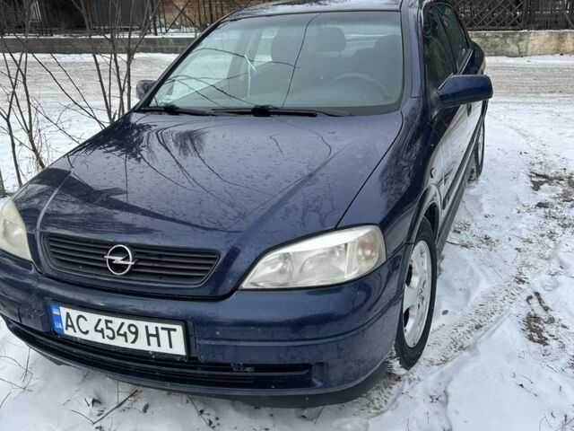 Синий Опель Астра, объемом двигателя 2 л и пробегом 250 тыс. км за 2200 $, фото 1 на Automoto.ua