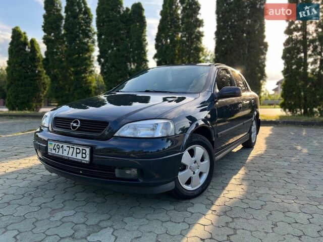 Синий Опель Астра, объемом двигателя 1.6 л и пробегом 230 тыс. км за 3900 $, фото 1 на Automoto.ua