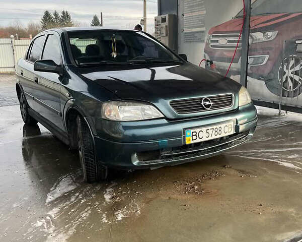 Синий Опель Астра, объемом двигателя 1.39 л и пробегом 243 тыс. км за 2500 $, фото 1 на Automoto.ua