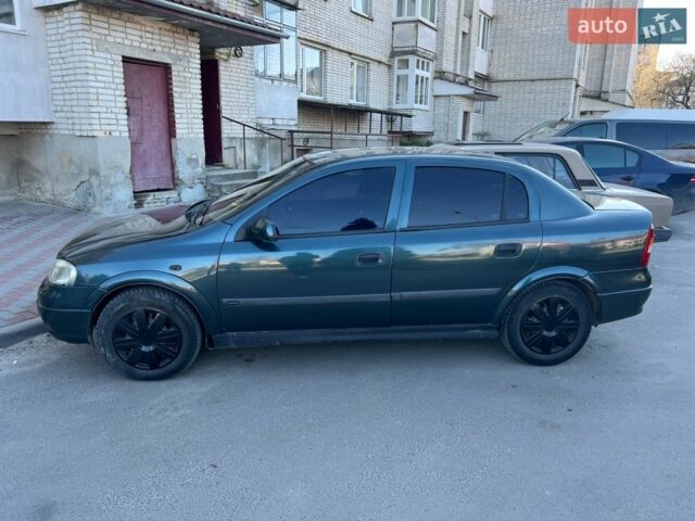 Синий Опель Астра, объемом двигателя 1.39 л и пробегом 290 тыс. км за 1900 $, фото 1 на Automoto.ua