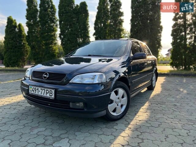 Синий Опель Астра, объемом двигателя 1.6 л и пробегом 230 тыс. км за 4000 $, фото 1 на Automoto.ua