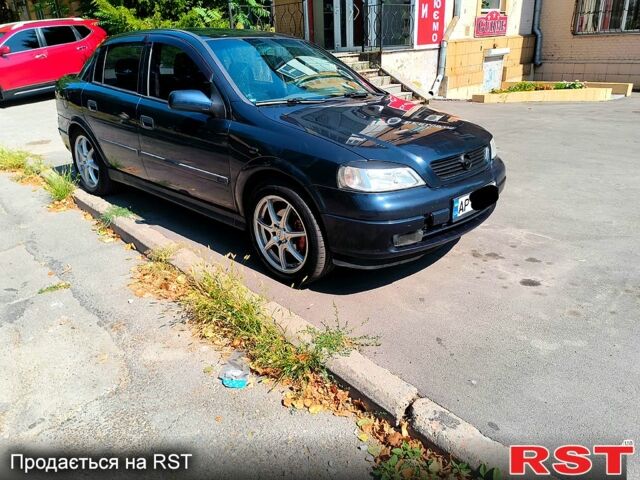 Синий Опель Астра, объемом двигателя 2.2 л и пробегом 290 тыс. км за 2600 $, фото 1 на Automoto.ua