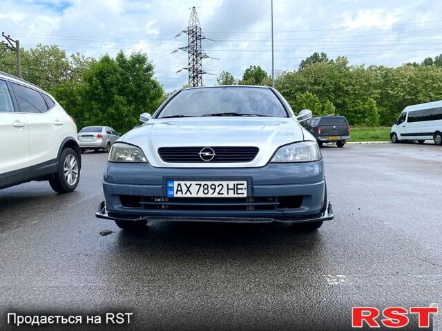 Синий Опель Астра, объемом двигателя 1.6 л и пробегом 167 тыс. км за 1800 $, фото 1 на Automoto.ua