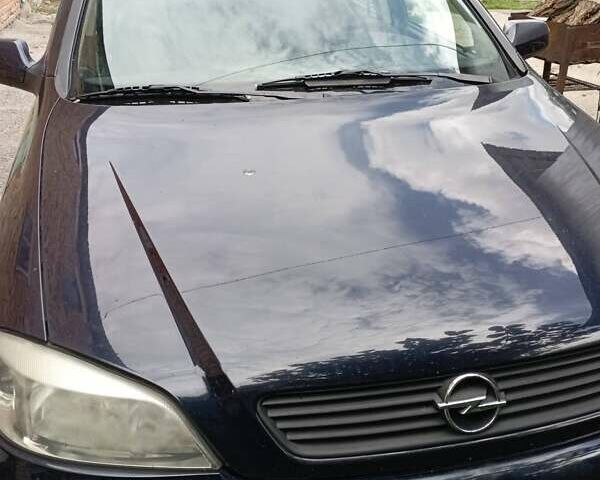 Синий Опель Астра, объемом двигателя 1.6 л и пробегом 273 тыс. км за 3100 $, фото 1 на Automoto.ua