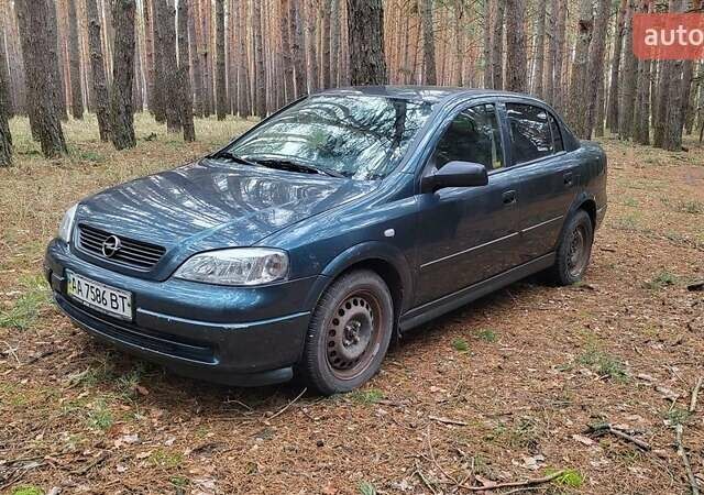 Синий Опель Астра, объемом двигателя 1.4 л и пробегом 196 тыс. км за 3600 $, фото 1 на Automoto.ua