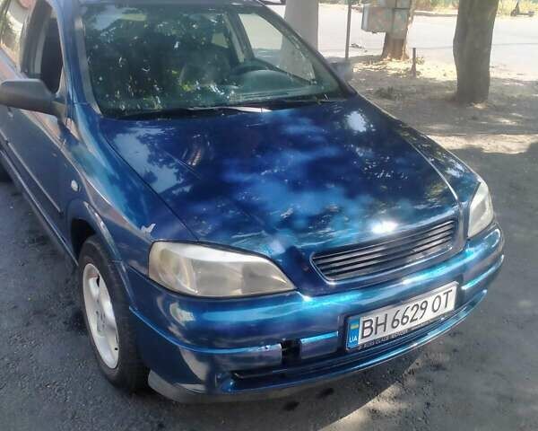 Синий Опель Астра, объемом двигателя 1.4 л и пробегом 180 тыс. км за 3200 $, фото 1 на Automoto.ua