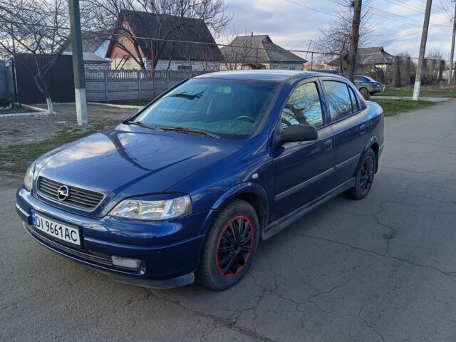 Синий Опель Астра, объемом двигателя 1.6 л и пробегом 365 тыс. км за 3000 $, фото 1 на Automoto.ua