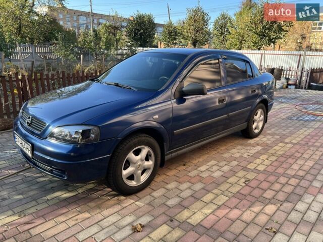 Синий Опель Астра, объемом двигателя 1.4 л и пробегом 209 тыс. км за 4300 $, фото 1 на Automoto.ua