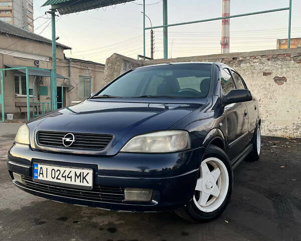 Синий Опель Астра, объемом двигателя 1.36 л и пробегом 250 тыс. км за 2700 $, фото 1 на Automoto.ua