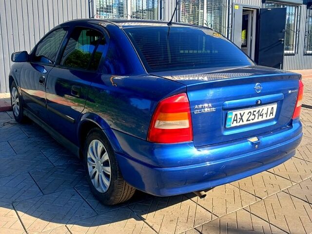Синий Опель Астра, объемом двигателя 1.4 л и пробегом 291 тыс. км за 3500 $, фото 1 на Automoto.ua