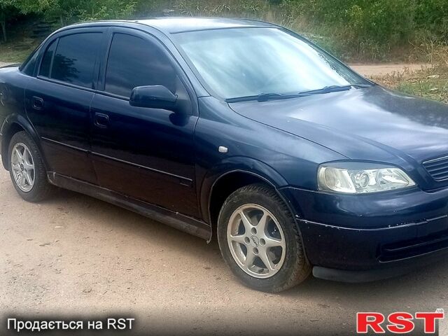 Синий Опель Астра, объемом двигателя 1.4 л и пробегом 208 тыс. км за 2600 $, фото 1 на Automoto.ua