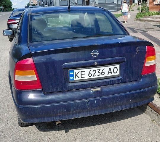 Синий Опель Астра, объемом двигателя 1.39 л и пробегом 288 тыс. км за 2600 $, фото 1 на Automoto.ua