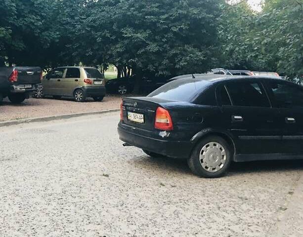 Синий Опель Астра, объемом двигателя 1.36 л и пробегом 350 тыс. км за 3900 $, фото 1 на Automoto.ua