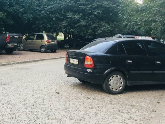 Синий Опель Астра, объемом двигателя 1.36 л и пробегом 350 тыс. км за 3900 $, фото 1 на Automoto.ua