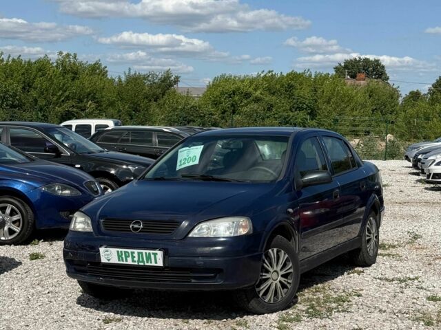 Синий Опель Астра, объемом двигателя 1.4 л и пробегом 284 тыс. км за 2550 $, фото 1 на Automoto.ua