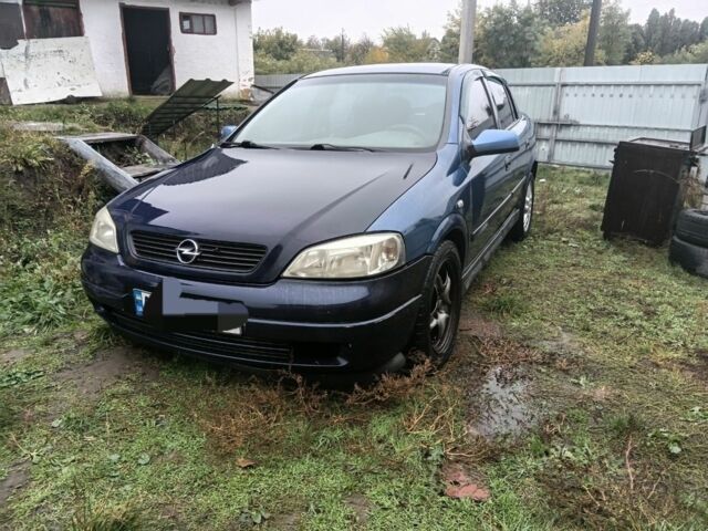 Синій Опель Астра, об'ємом двигуна 2 л та пробігом 198 тис. км за 1551 $, фото 1 на Automoto.ua