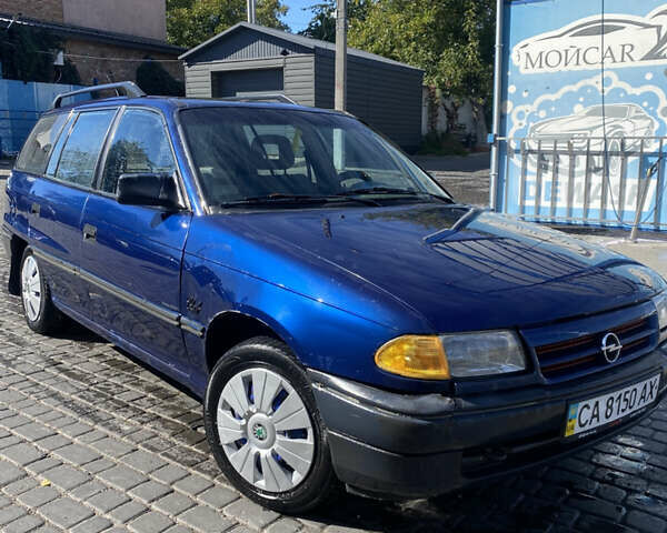 Синий Опель Астра, объемом двигателя 1.6 л и пробегом 333 тыс. км за 1250 $, фото 1 на Automoto.ua