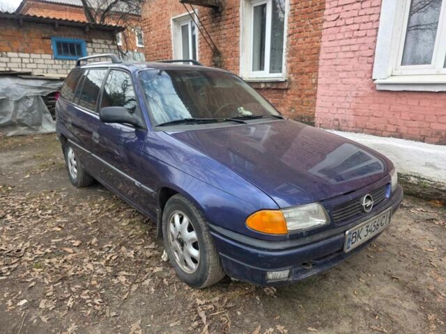 Синий Опель Астра, объемом двигателя 1.6 л и пробегом 370 тыс. км за 1450 $, фото 1 на Automoto.ua
