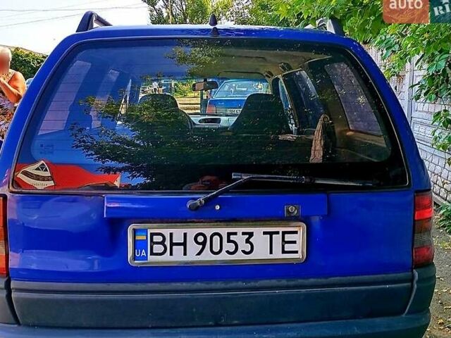 Синий Опель Астра, объемом двигателя 1.7 л и пробегом 250 тыс. км за 2100 $, фото 1 на Automoto.ua