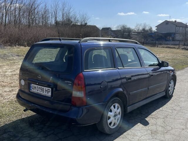 Синий Опель Астра, объемом двигателя 1.6 л и пробегом 320 тыс. км за 2200 $, фото 1 на Automoto.ua