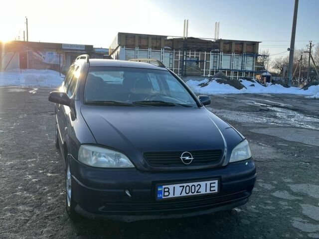 Синий Опель Астра, объемом двигателя 2 л и пробегом 300 тыс. км за 2500 $, фото 1 на Automoto.ua