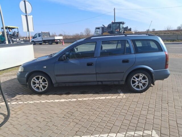 Синій Опель Астра, об'ємом двигуна 2 л та пробігом 480 тис. км за 1943 $, фото 1 на Automoto.ua