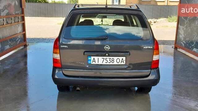 Синий Опель Астра, объемом двигателя 1.6 л и пробегом 390 тыс. км за 2395 $, фото 1 на Automoto.ua