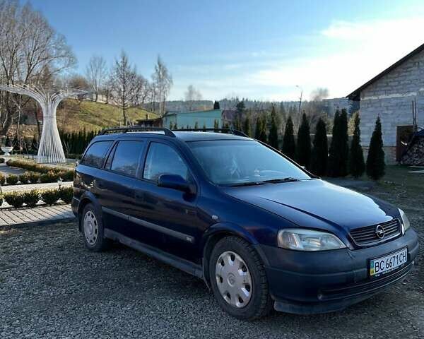 Синий Опель Астра, объемом двигателя 2 л и пробегом 395 тыс. км за 1600 $, фото 1 на Automoto.ua