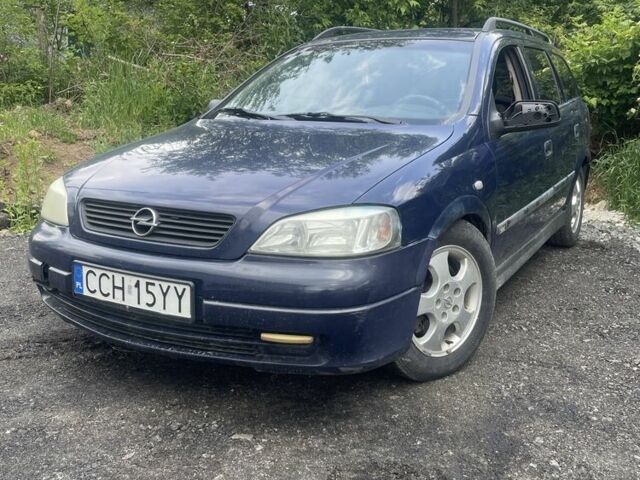 Синий Опель Астра, объемом двигателя 2 л и пробегом 200 тыс. км за 1200 $, фото 1 на Automoto.ua