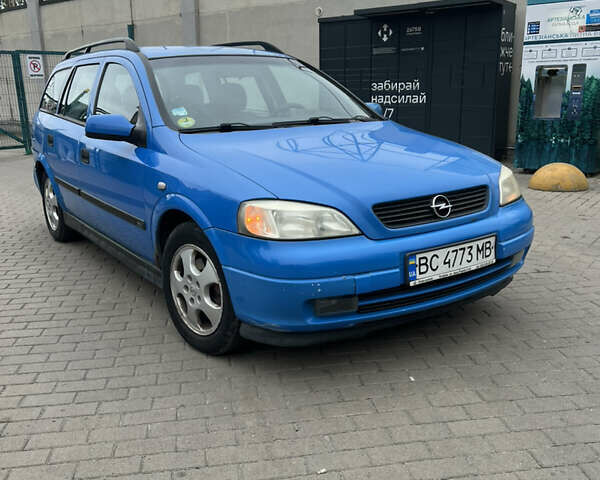 Синій Опель Астра, об'ємом двигуна 2 л та пробігом 316 тис. км за 1499 $, фото 1 на Automoto.ua