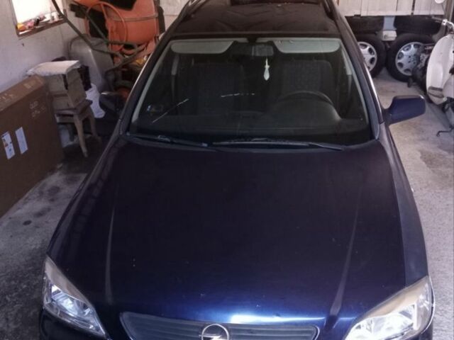 Синій Опель Астра, об'ємом двигуна 2 л та пробігом 280 тис. км за 1750 $, фото 1 на Automoto.ua