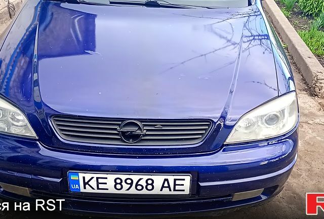 Синий Опель Астра, объемом двигателя 2 л и пробегом 250 тыс. км за 2950 $, фото 1 на Automoto.ua