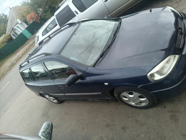 Синій Опель Астра, об'ємом двигуна 2 л та пробігом 323 тис. км за 2050 $, фото 1 на Automoto.ua