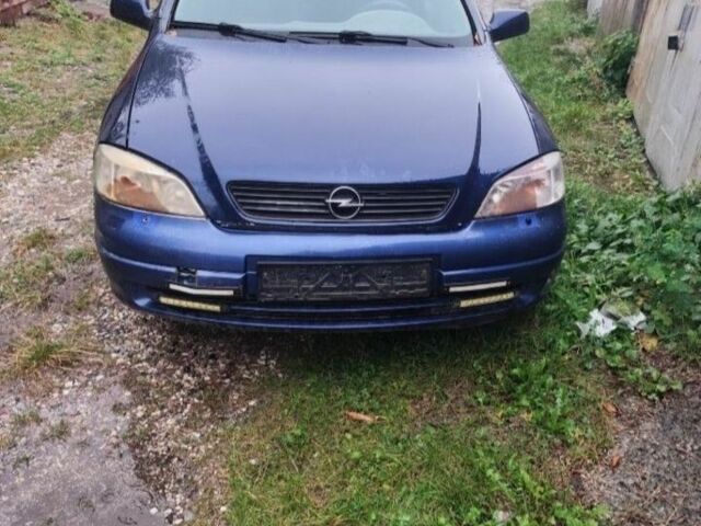 Синий Опель Астра, объемом двигателя 2 л и пробегом 240 тыс. км за 639 $, фото 1 на Automoto.ua