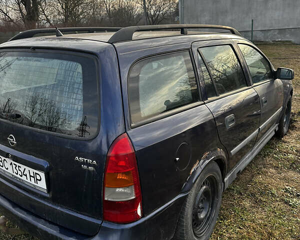 Синий Опель Астра, объемом двигателя 2 л и пробегом 300 тыс. км за 1650 $, фото 1 на Automoto.ua