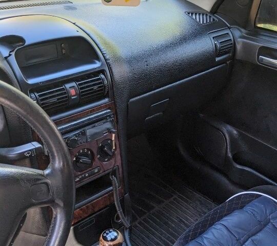 Синій Опель Астра, об'ємом двигуна 2 л та пробігом 300 тис. км за 1009 $, фото 1 на Automoto.ua