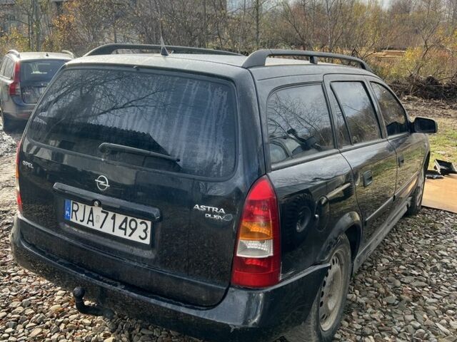 Синий Опель Астра, объемом двигателя 2 л и пробегом 260 тыс. км за 850 $, фото 1 на Automoto.ua