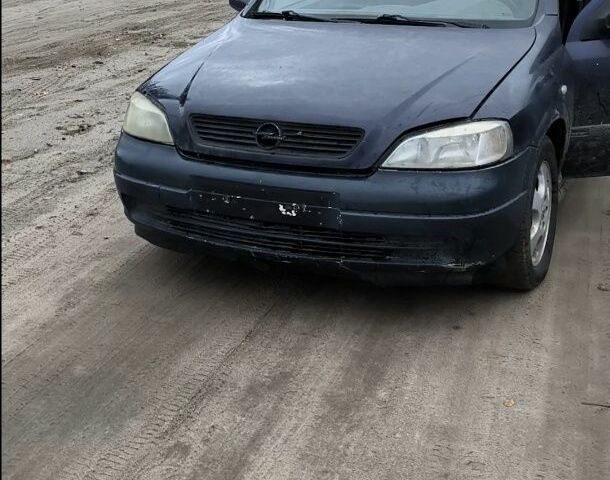 Синий Опель Астра, объемом двигателя 2 л и пробегом 300 тыс. км за 870 $, фото 1 на Automoto.ua