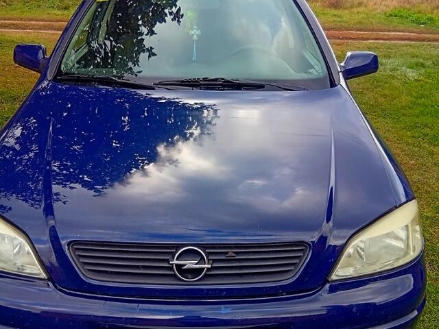 Синий Опель Астра, объемом двигателя 2 л и пробегом 245 тыс. км за 3200 $, фото 1 на Automoto.ua